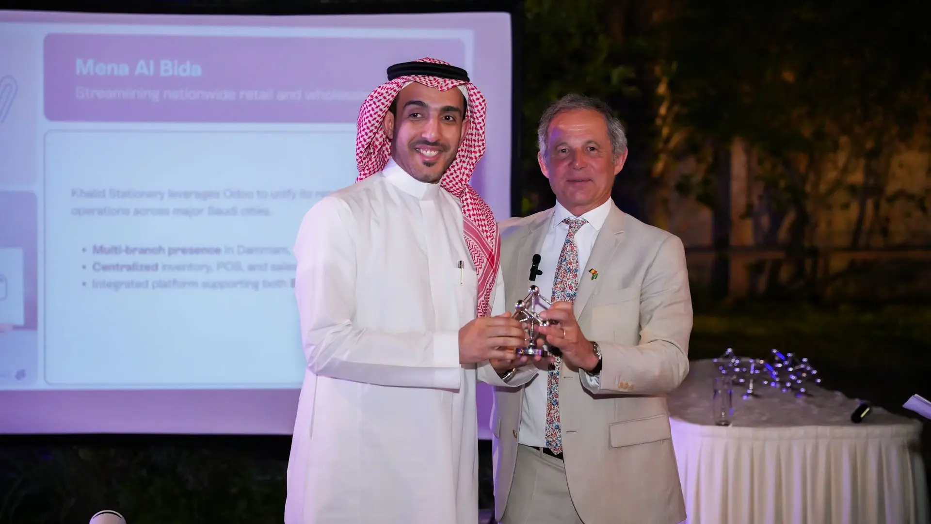 Group photo of Eezee team at a conference in Saudi Arabia