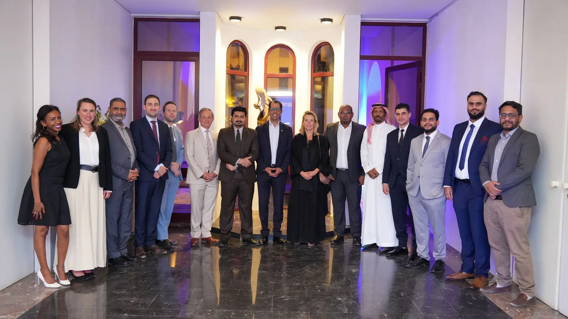 Group photo of Eezee team at a conference in Saudi Arabia