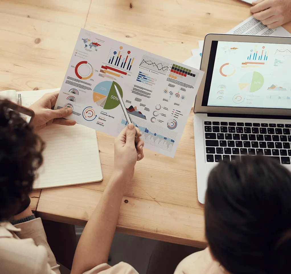 Group of people collaborating in an office environment discussing strategies