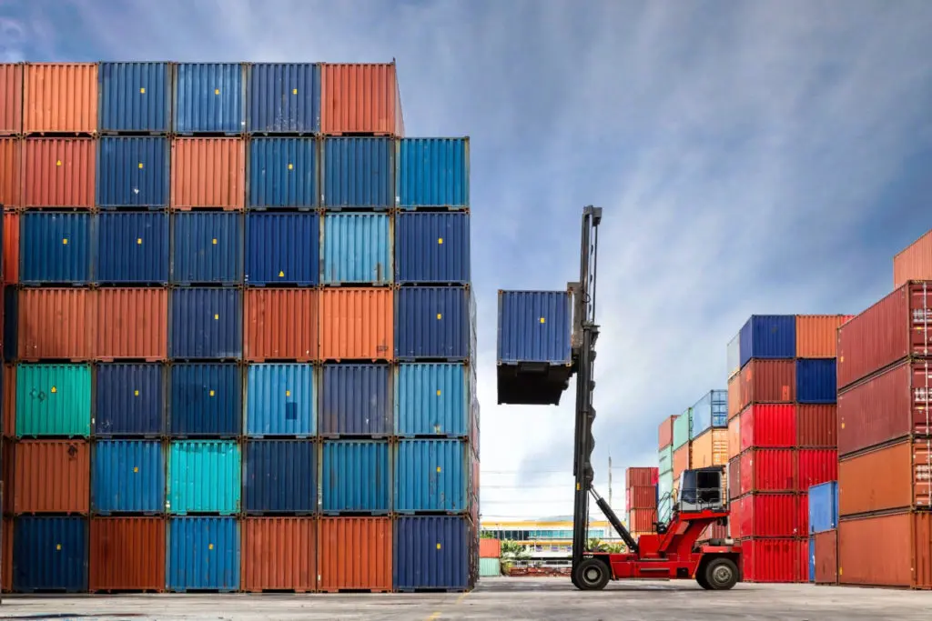 Shipping containers yard illustrating logistics and freight operations.